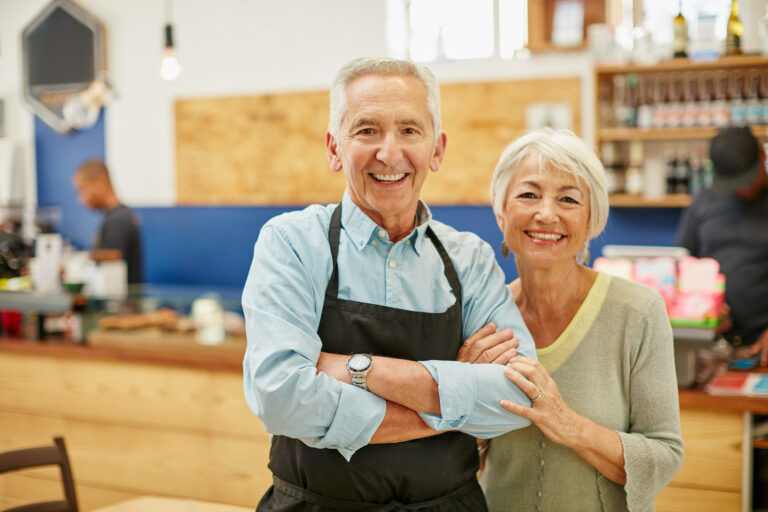 older man running a business